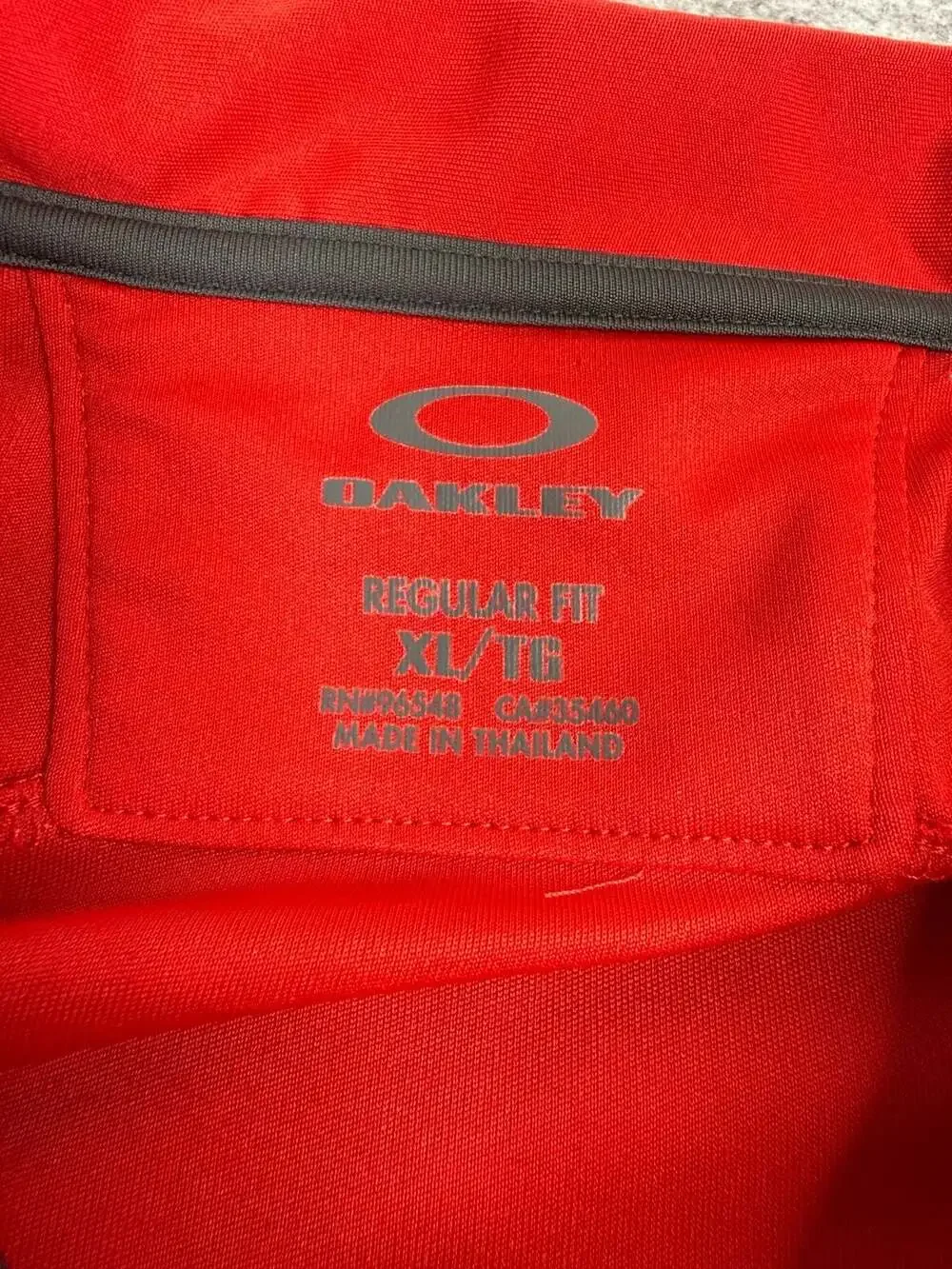 Oakley Polo Shirt Size XL Red Striped Golf Short Sleeve